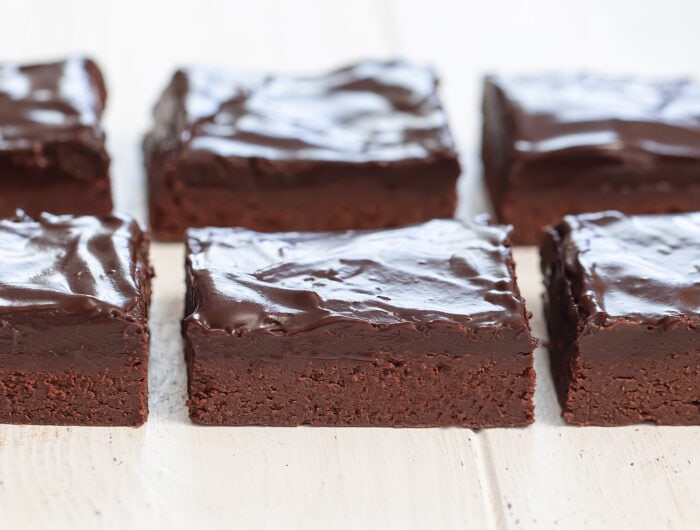frosted brownies lined up.