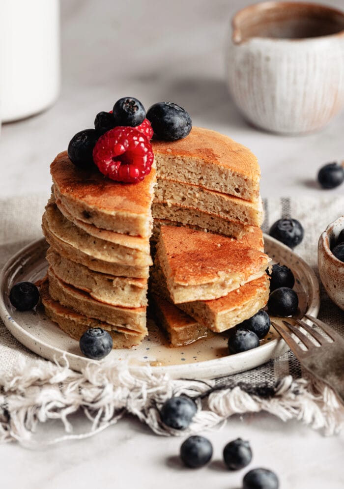 a stack of pancakes sliced.
