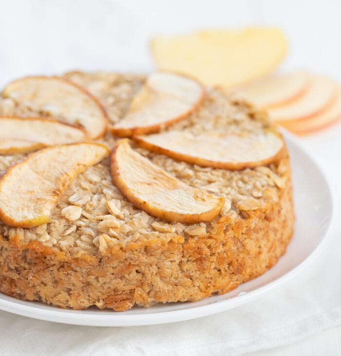 an apple cake on a serving plate.