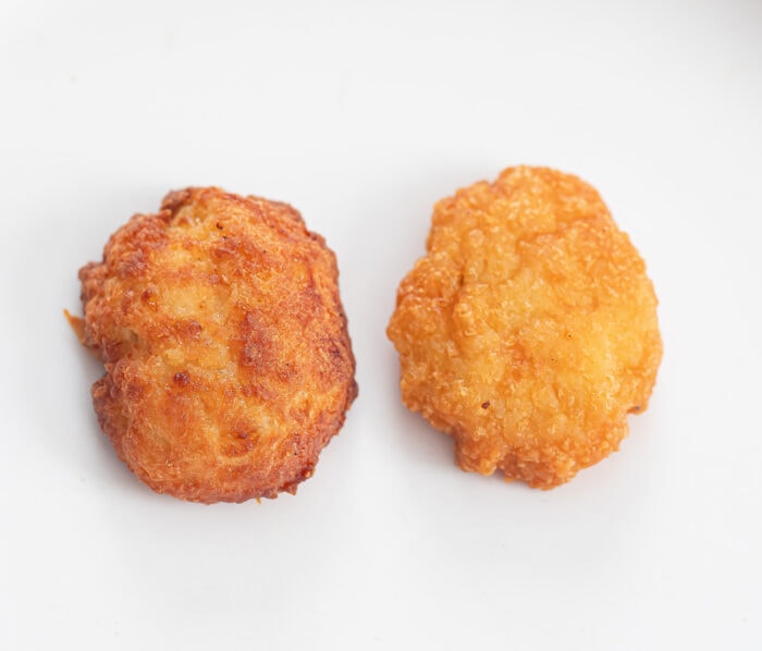 a chicken nugget made with mozzarella cheese and one made with Parmesan.