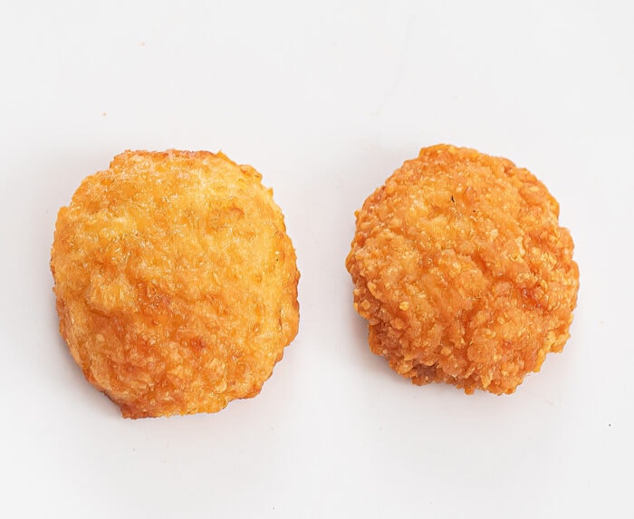 two cooked chicken nuggets.