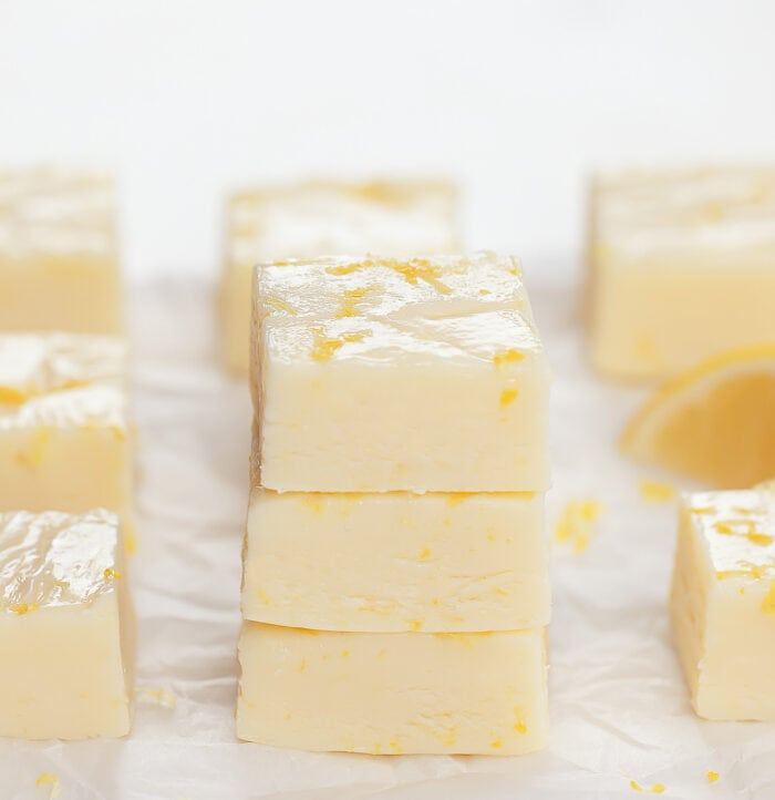 a stack of three pieces of lemon fudge.
