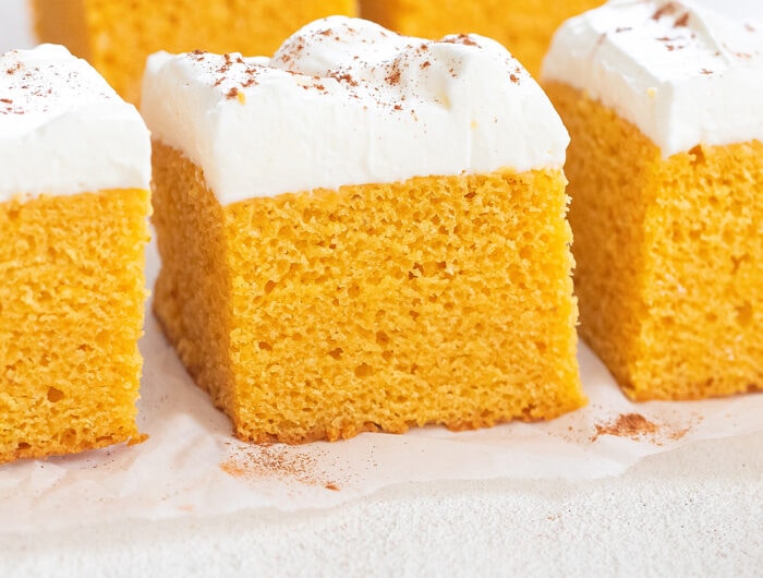 slices of frosted pumpkin cake.