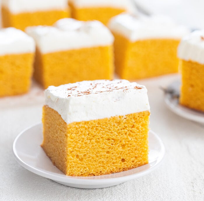 a slice of pumpkin cake on a small plate.