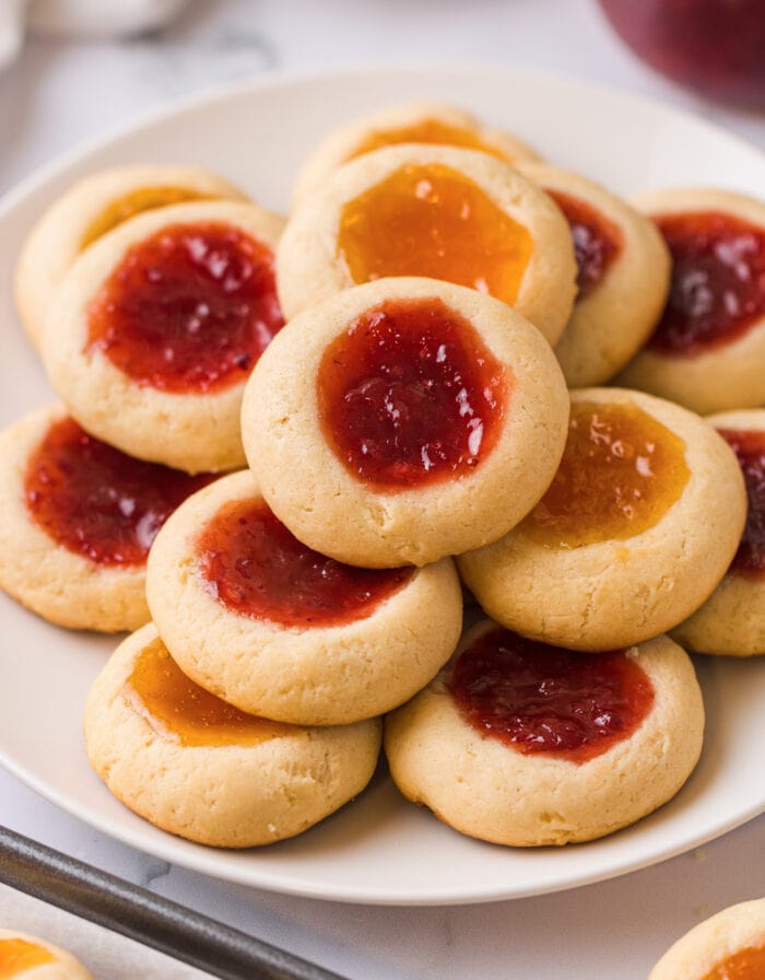 a plate of thumbprint cookies.