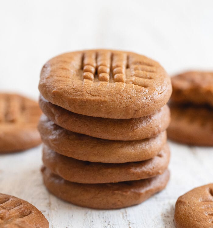 a stack of five peanut butter cookies.