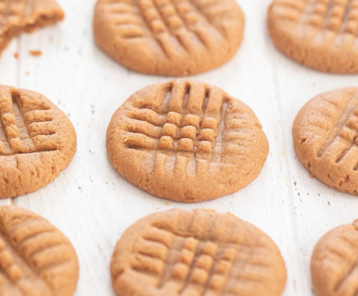 a row of peanut butter cookies.