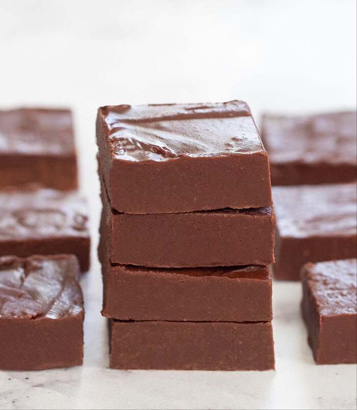 a stack of four pieces of fudge