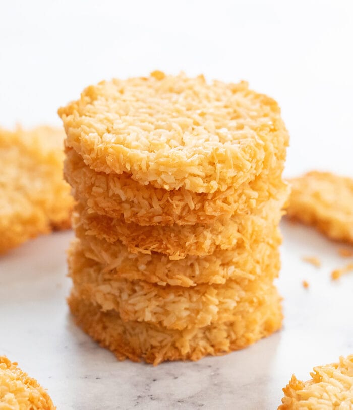 a stack of crispy coconut cookies.