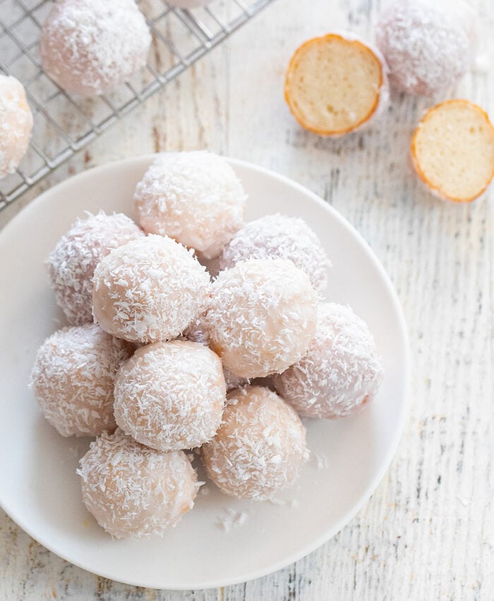 a plate of coconut donut holes.