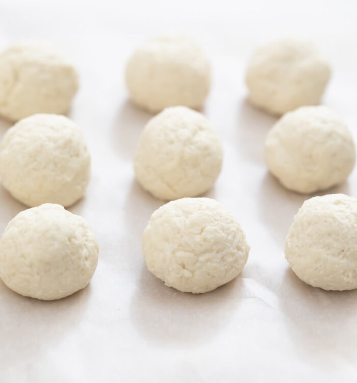 the dough balls on parchment.