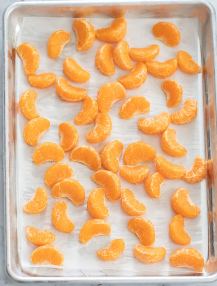 Orange slices on a baking sheet