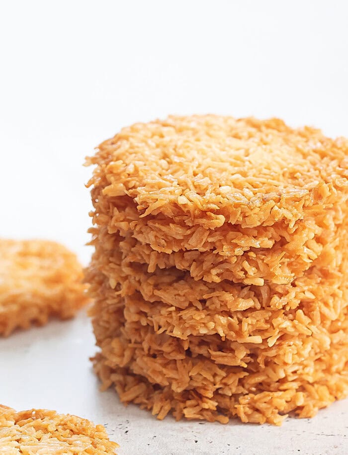 A close up of coconut cookies stacked