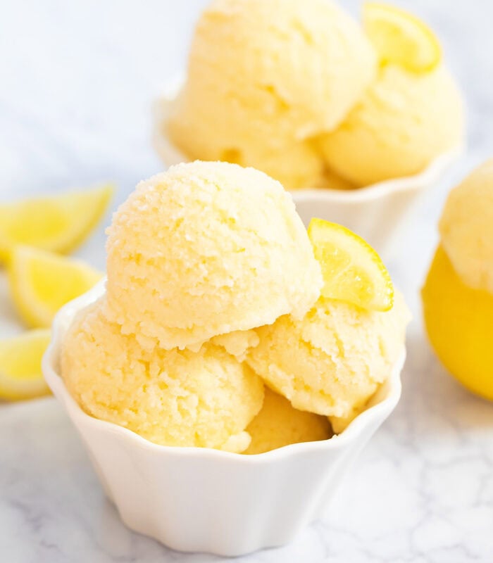 Scoops of lemon sorbet in a small white dish
