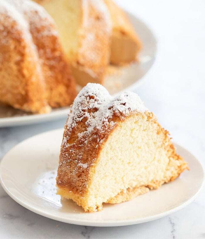 A slice of Bundt cake on a small white plate