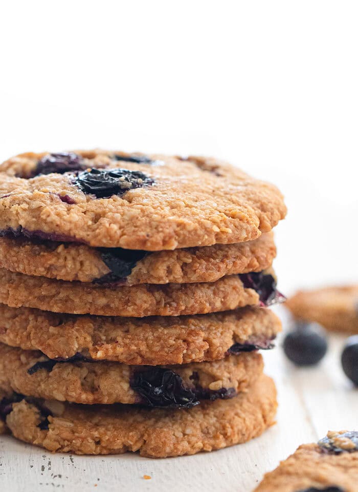 A close up of crispy blueberry oatmeal cookies