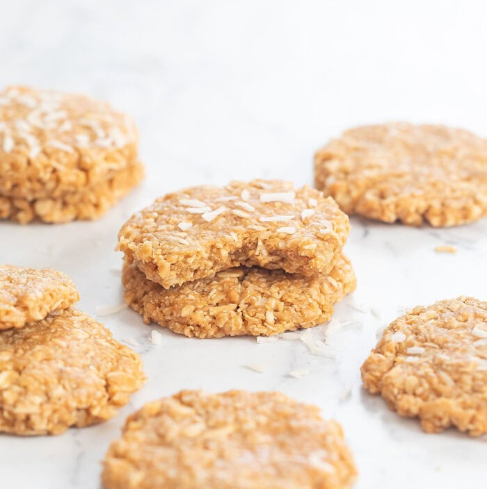 A bite taken from a coconut oatmeal cookie