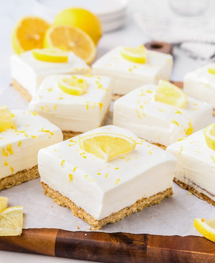 Lemon bars with a lemon slice on top