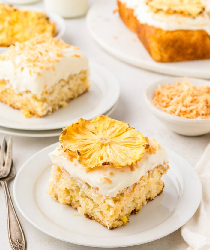 Slice of pineapple cake on a white circle plate