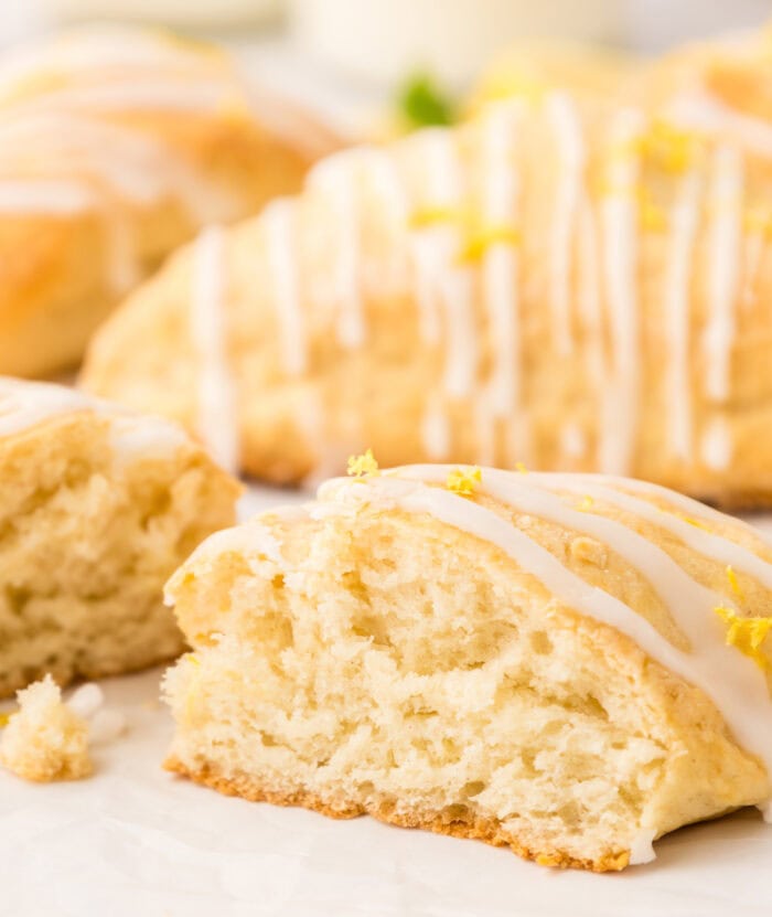 Lemon scone cut in half with lemon icing