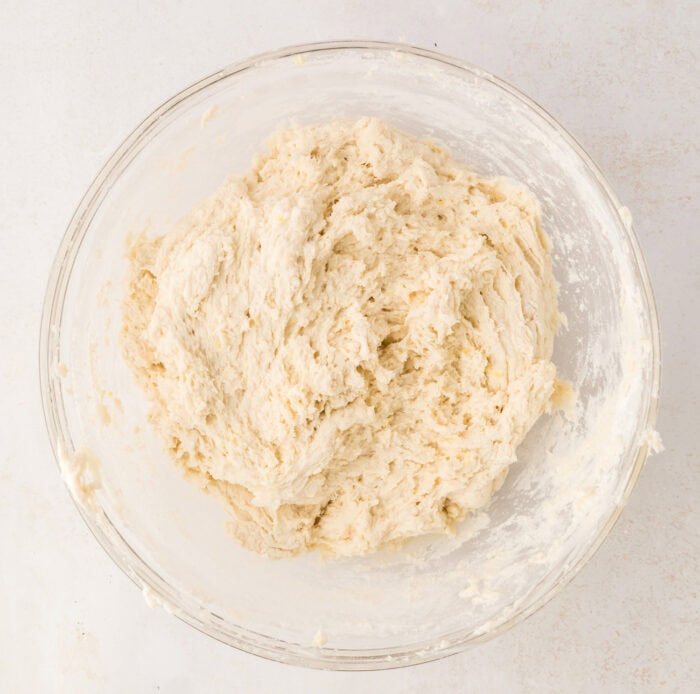 Dough in a glass bowl for lemon scones