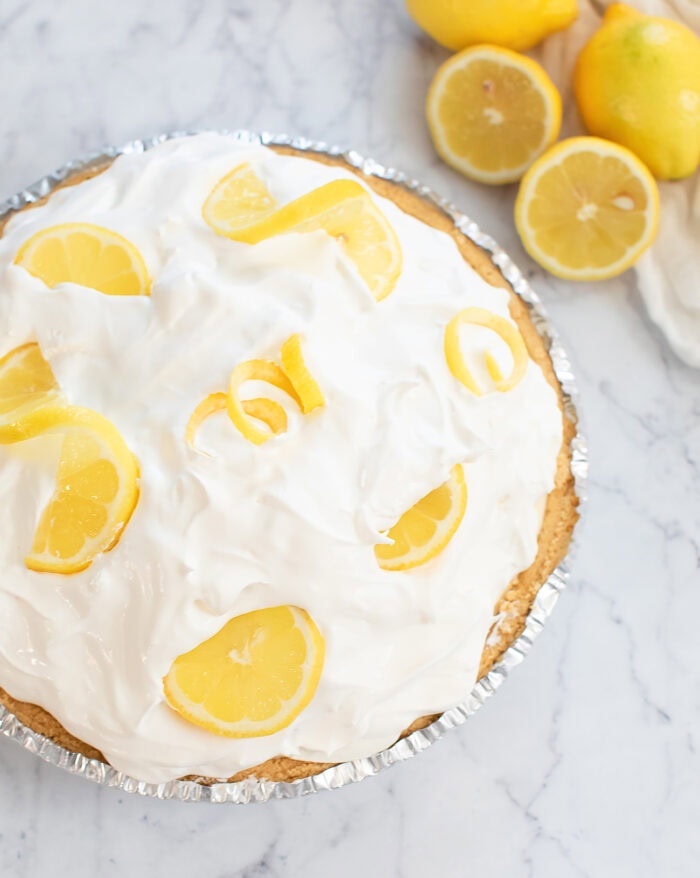 Lemon cloud pie in a graham cracker crust