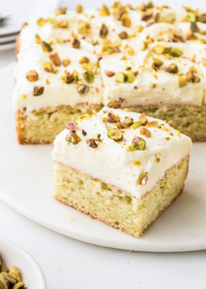 A slice of zucchini cake with cream cheese frosting