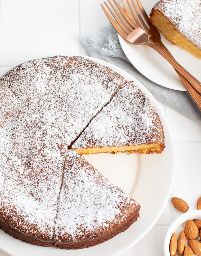 Almond cake with slices cut from it