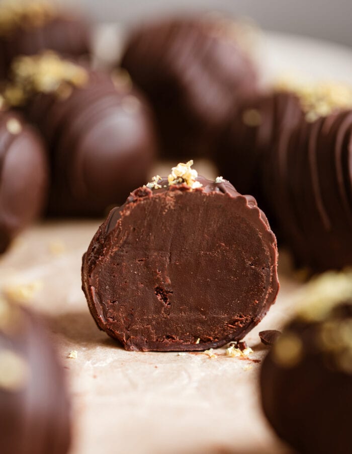 A lemon chocolate truffle cut in half