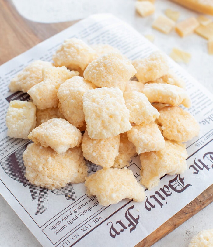 Crispy cheese puffs in a pile