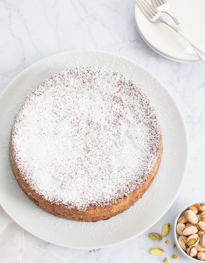 Pistachio cake dusted with powdered sugar