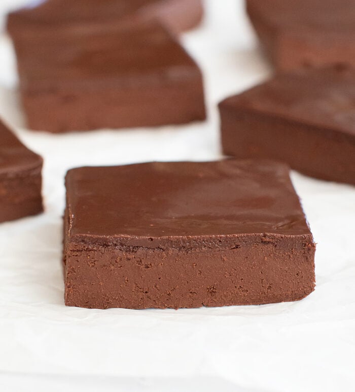 A no bake brownie square with chocolate frosting on top