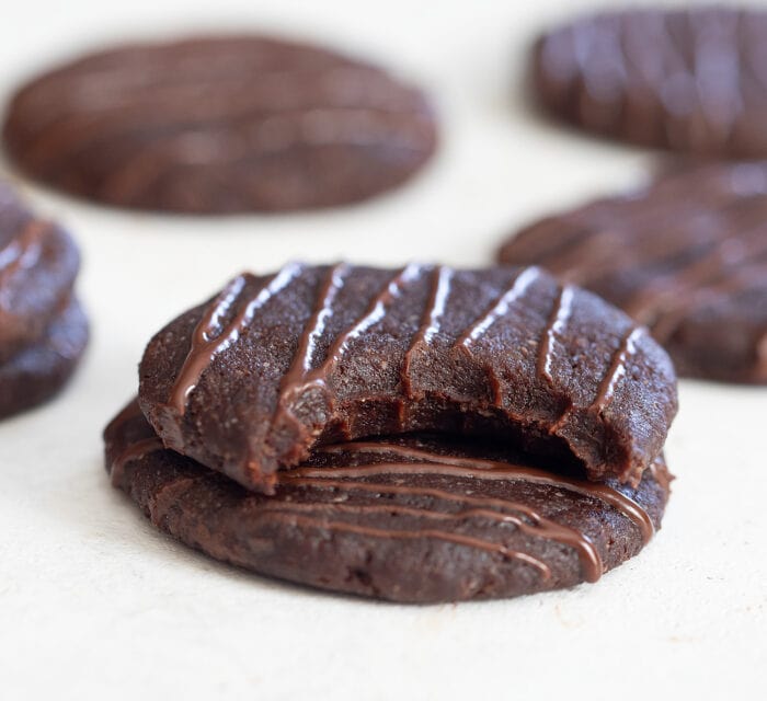 A bite taken from a no bake chocolate cookie