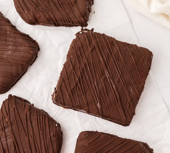 Ice Cream Bars dipped in chocolate with a chocolate drizzle