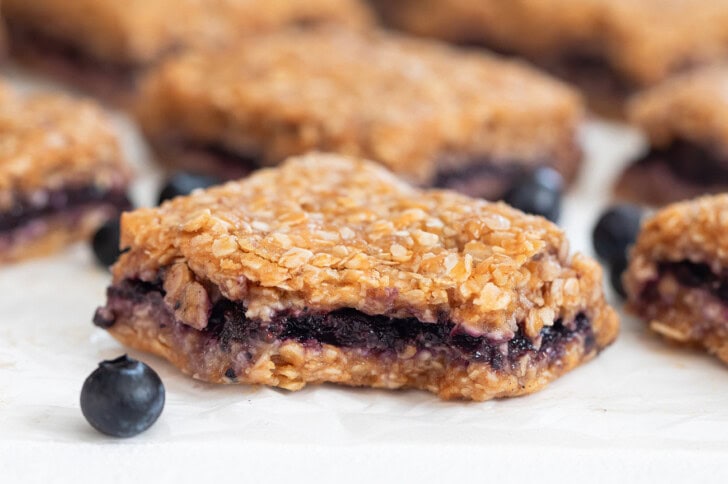 Layered oatmeal bars with a blueberry center