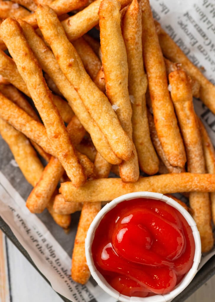French fries with a side of ketchup