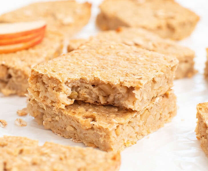 A bite taken from an apple oatmeal bar