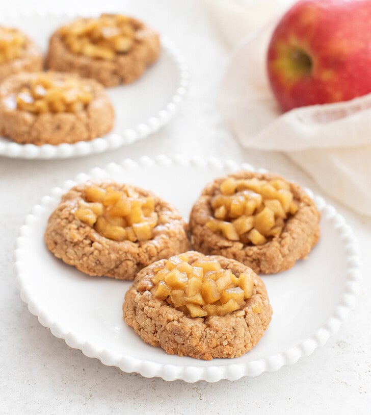 Three Apple Pie Oatmeal Cookies on a white plate