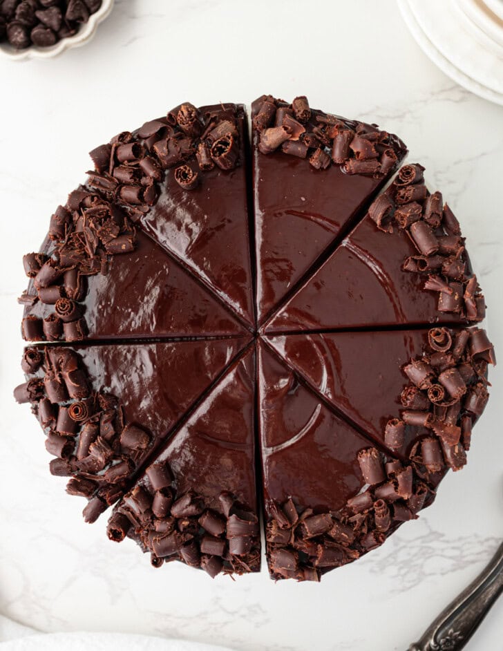 A chocolate cake cut into eight slices