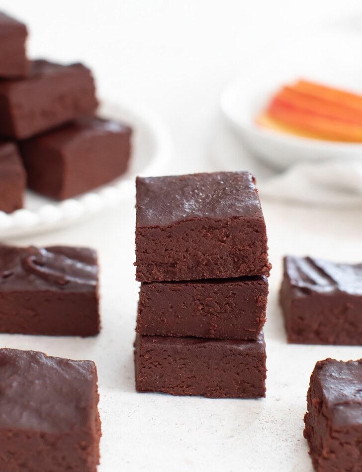 A stack of three apple fudge pieces