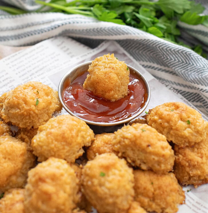 A tot dipped in ketchup