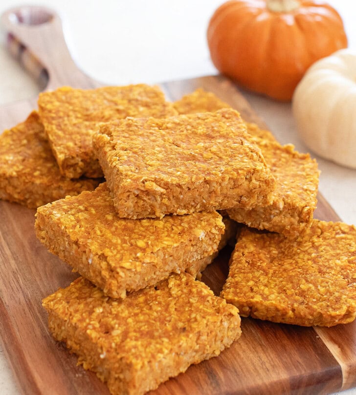 Pumpkin Oatmeal Bars on a wooden serving board