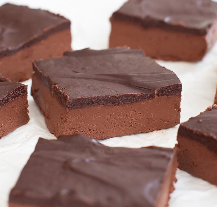 Brownies cut into squares with a chocolate frosting