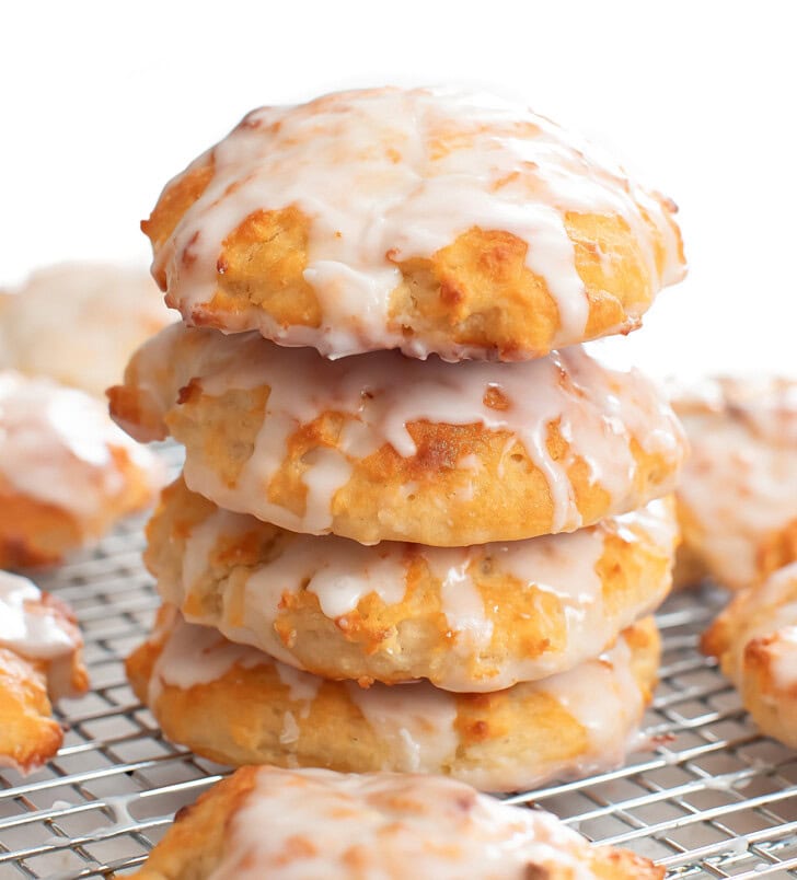 A stack of four glazed fritters