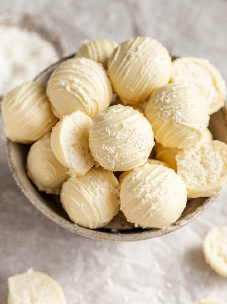 Coconut truffles in a small bowl