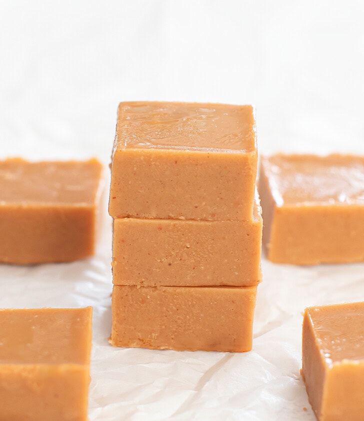 A stack of three Peanut Butter Fudge pieces