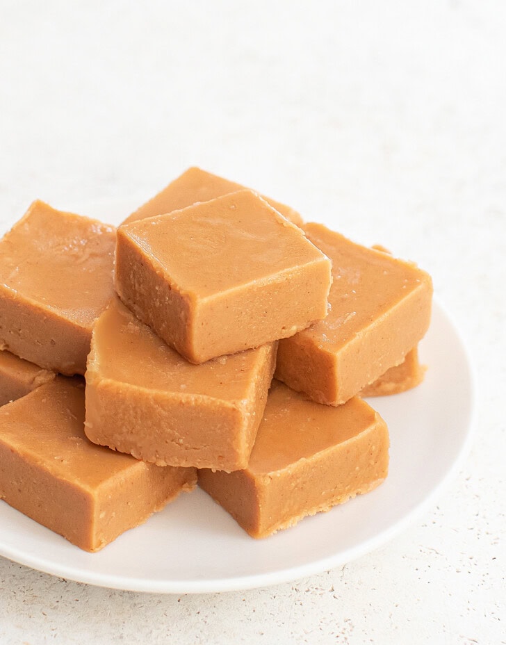 Peanut Butter Fudge squares on a white plate