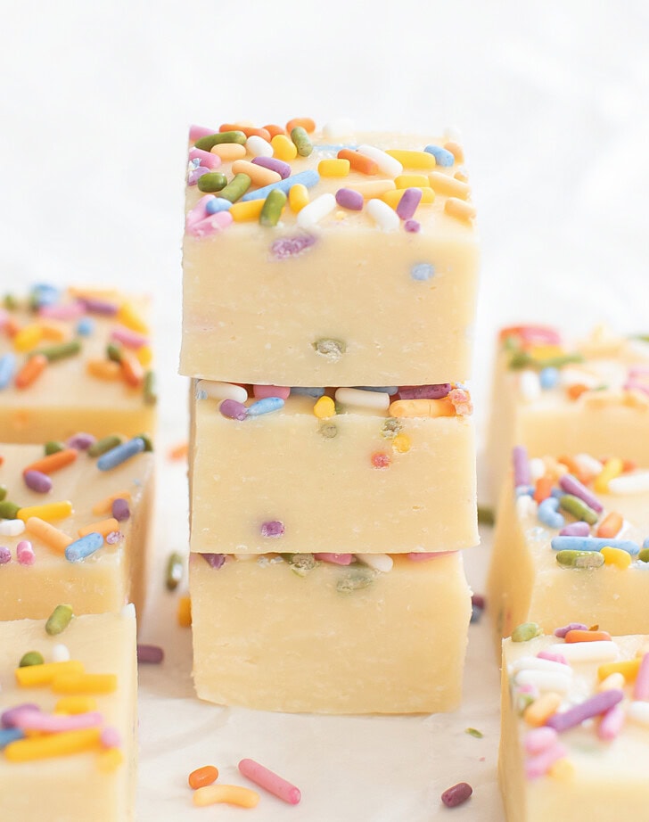 A stack of three Sugar Cookie Fudge pieces