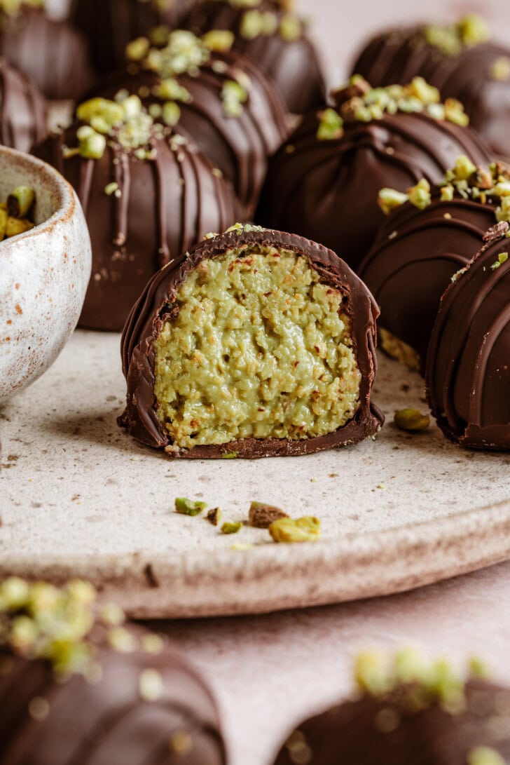 A Dubai Truffle cut in half with a creamy center
