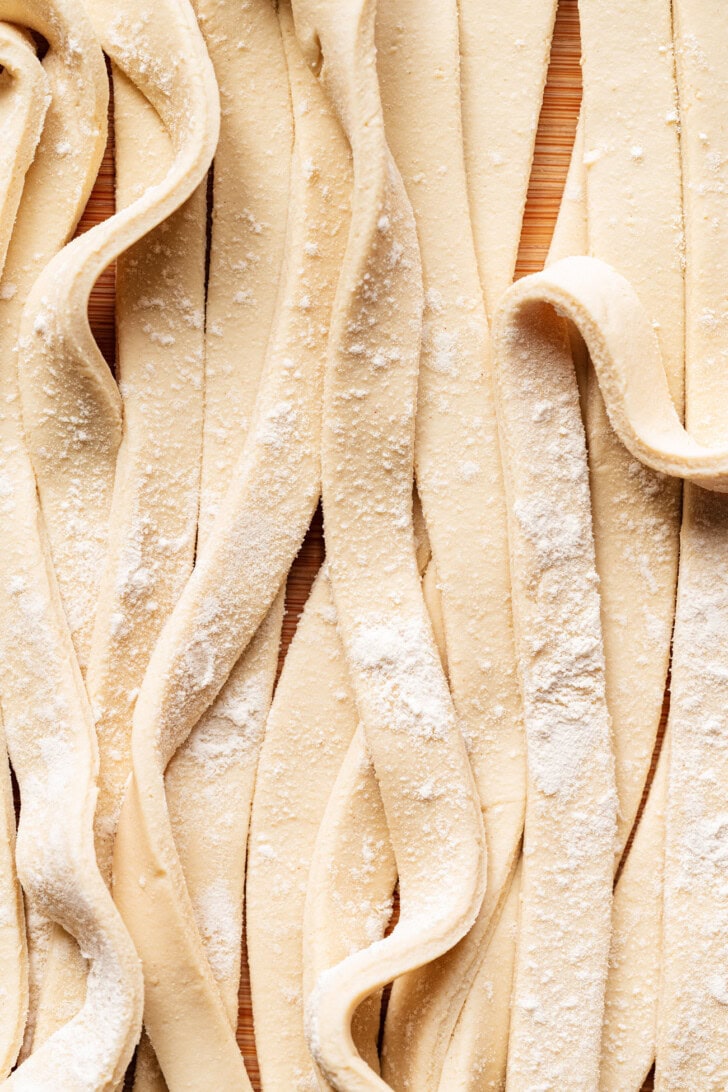 Pasta dough cut into long strips